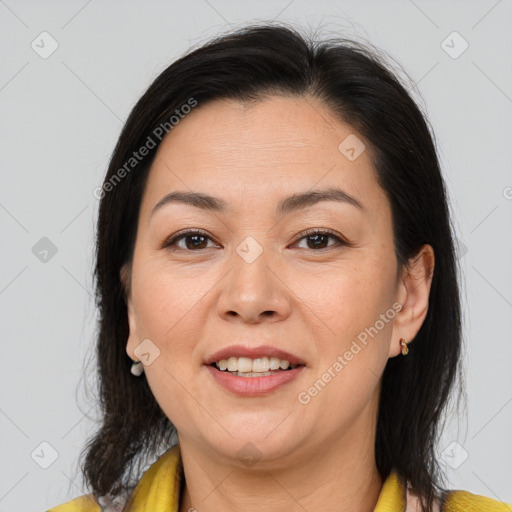 Joyful white young-adult female with medium  brown hair and brown eyes