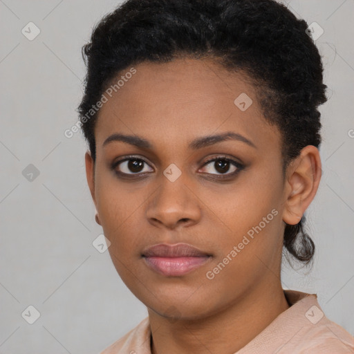 Neutral black young-adult female with short  black hair and brown eyes