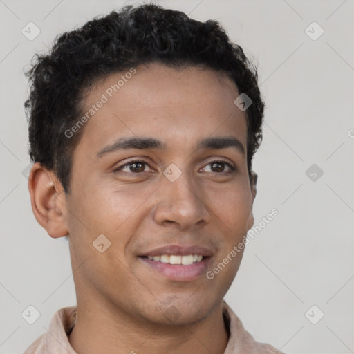 Joyful latino young-adult male with short  brown hair and brown eyes