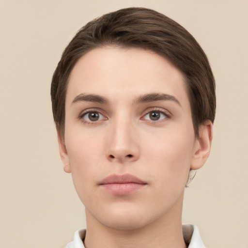 Neutral white young-adult female with short  brown hair and brown eyes