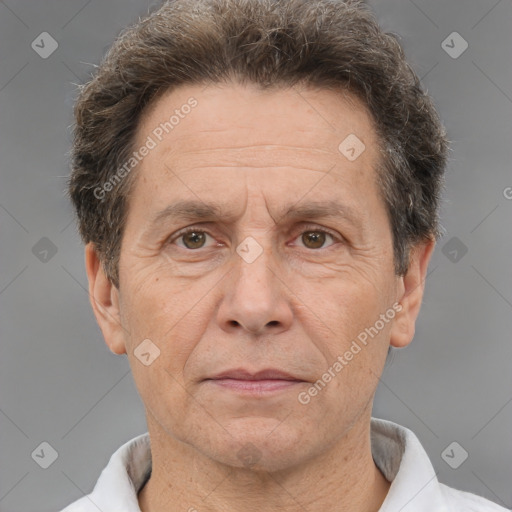 Joyful white middle-aged male with short  brown hair and brown eyes