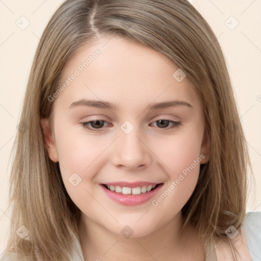 Joyful white child female with long  brown hair and brown eyes