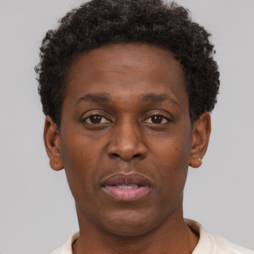 Neutral black young-adult male with short  brown hair and brown eyes