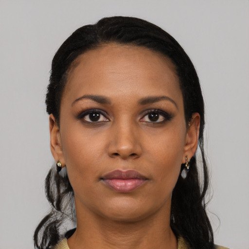 Neutral black young-adult female with long  black hair and brown eyes