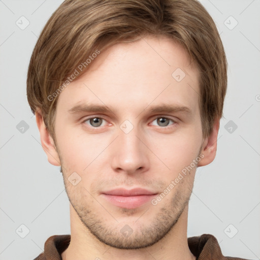 Neutral white young-adult male with short  brown hair and grey eyes