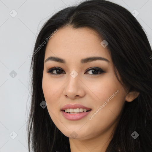 Joyful asian young-adult female with long  brown hair and brown eyes