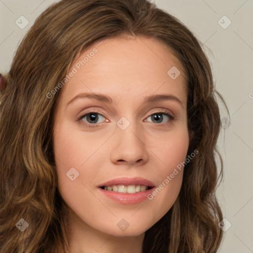 Joyful white young-adult female with long  brown hair and green eyes