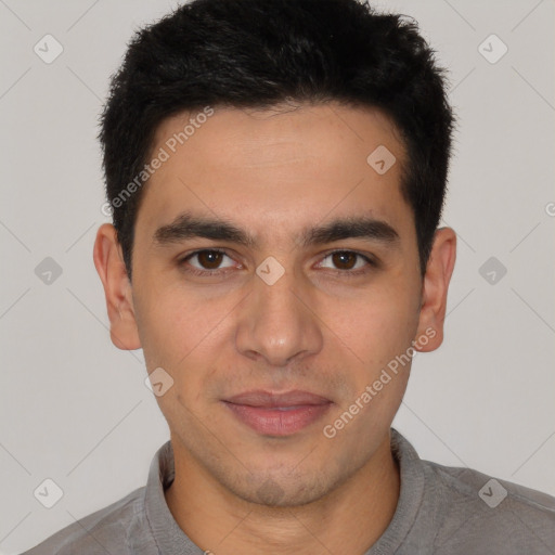 Joyful white young-adult male with short  black hair and brown eyes