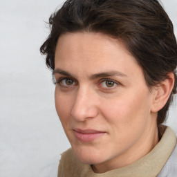 Joyful white adult female with short  brown hair and brown eyes