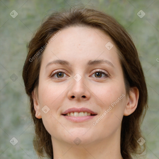 Joyful white young-adult female with medium  brown hair and green eyes