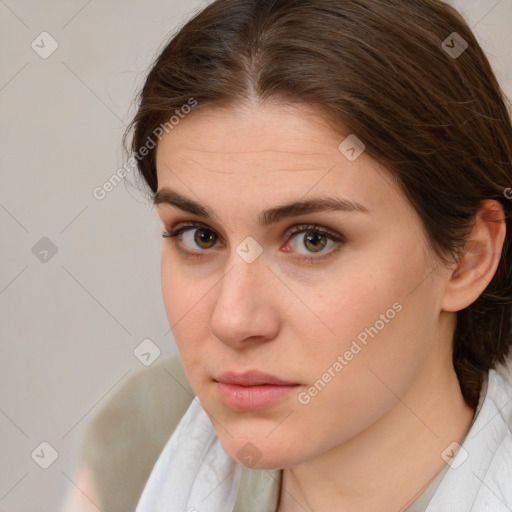 Neutral white young-adult female with medium  brown hair and brown eyes