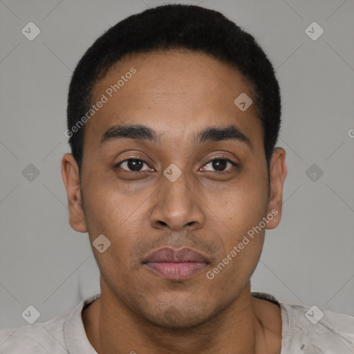 Joyful latino young-adult male with short  black hair and brown eyes