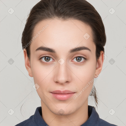 Neutral white young-adult female with medium  brown hair and brown eyes