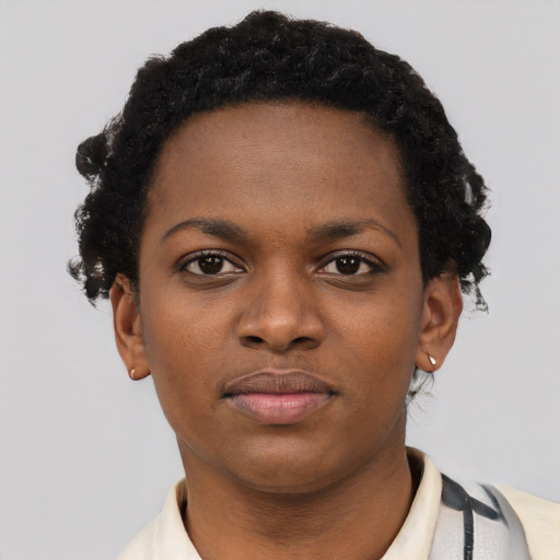 Neutral black young-adult female with short  black hair and brown eyes