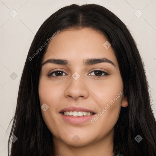 Joyful white young-adult female with long  black hair and brown eyes