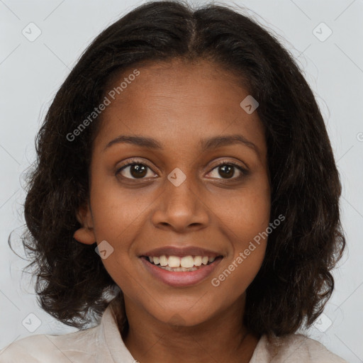 Joyful black young-adult female with medium  brown hair and brown eyes