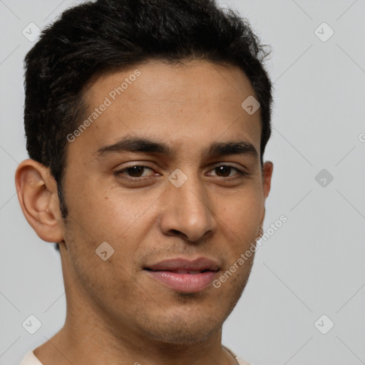 Joyful latino young-adult male with short  brown hair and brown eyes