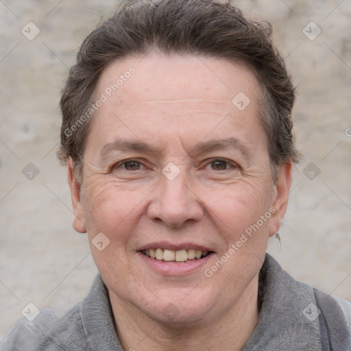 Joyful white adult male with short  brown hair and grey eyes