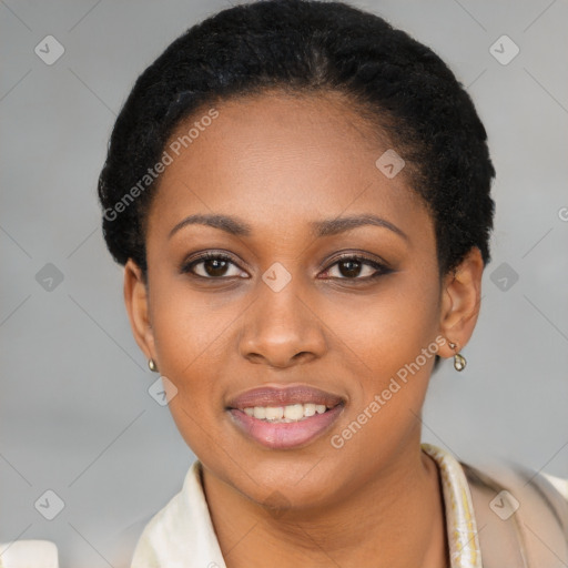 Joyful black young-adult female with short  black hair and brown eyes