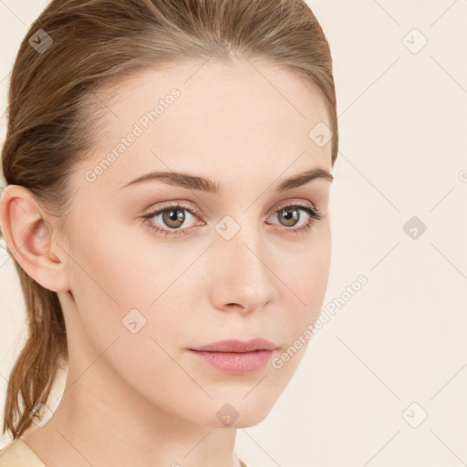 Neutral white young-adult female with long  brown hair and green eyes