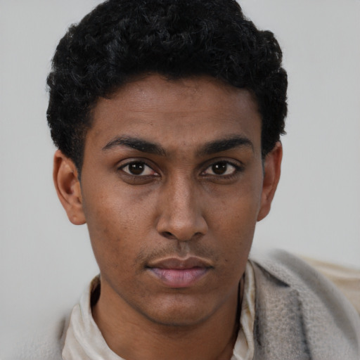 Neutral latino young-adult male with short  brown hair and brown eyes