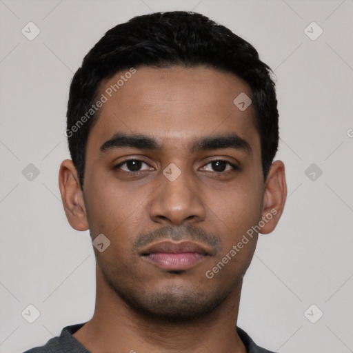 Neutral latino young-adult male with short  black hair and brown eyes