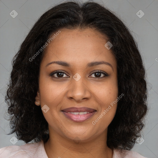 Joyful black young-adult female with medium  brown hair and brown eyes