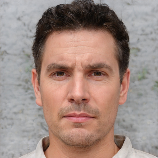 Neutral white adult male with short  brown hair and brown eyes