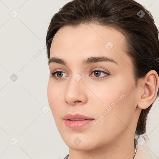 Neutral white young-adult female with medium  brown hair and brown eyes