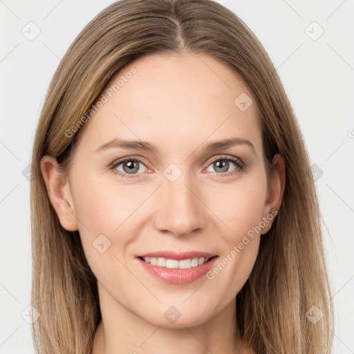 Joyful white young-adult female with long  brown hair and grey eyes