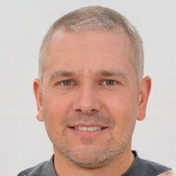 Neutral white adult male with short  brown hair and brown eyes