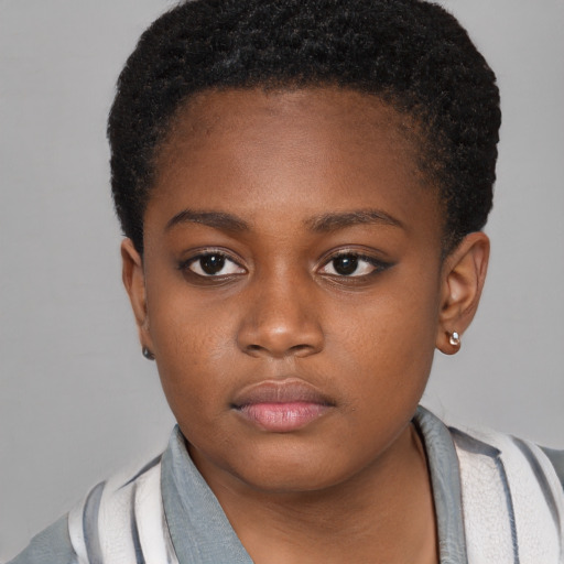 Neutral black child female with short  brown hair and brown eyes