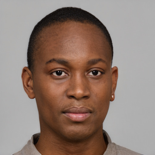 Neutral black young-adult male with short  brown hair and brown eyes