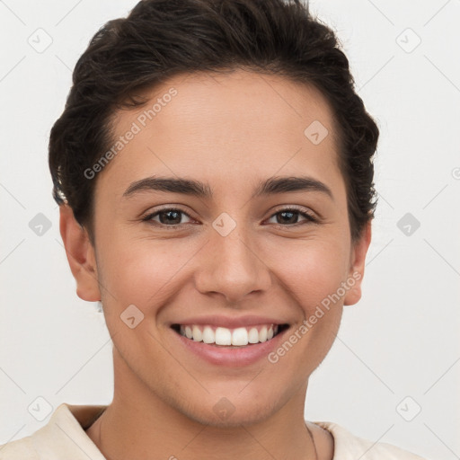 Joyful white young-adult female with short  brown hair and brown eyes