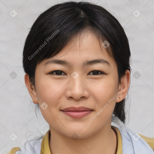 Joyful asian young-adult female with medium  brown hair and brown eyes