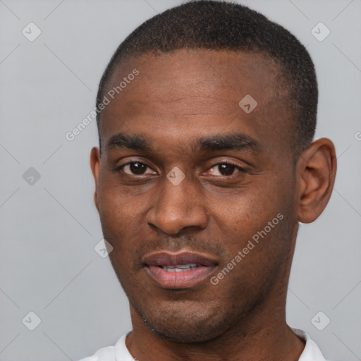 Joyful latino young-adult male with short  brown hair and brown eyes