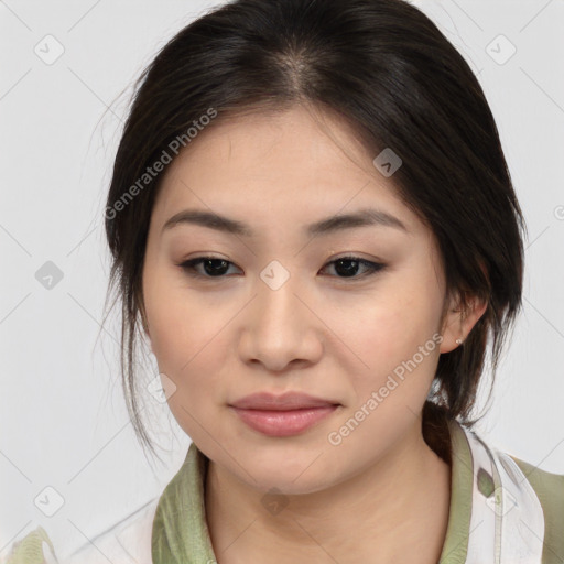 Joyful asian young-adult female with medium  brown hair and brown eyes