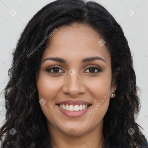 Joyful latino young-adult female with long  brown hair and brown eyes