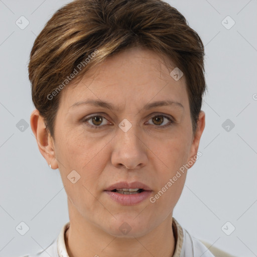 Joyful white adult female with short  brown hair and brown eyes