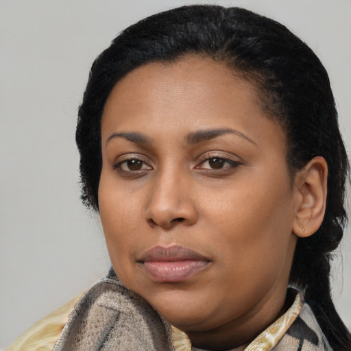Neutral black young-adult female with medium  black hair and brown eyes