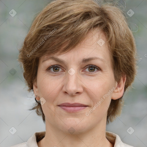 Joyful white adult female with medium  brown hair and grey eyes