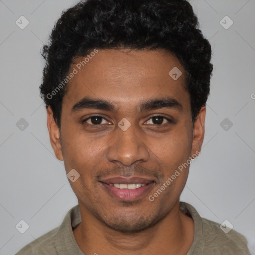 Joyful black young-adult male with short  black hair and brown eyes