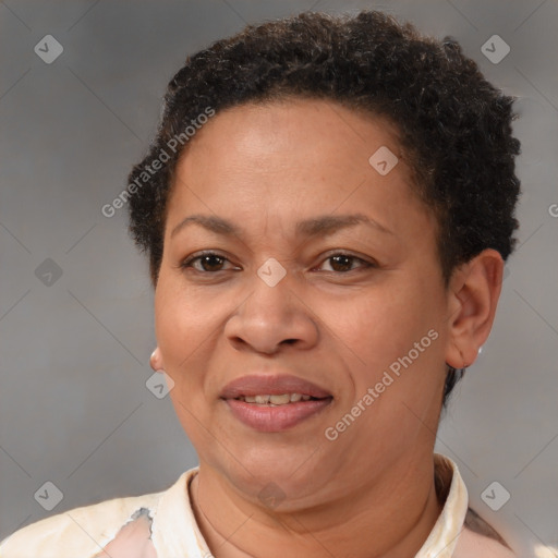 Joyful black adult female with short  brown hair and brown eyes