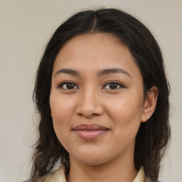 Joyful asian young-adult female with medium  brown hair and brown eyes