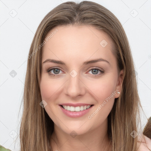 Joyful white young-adult female with long  brown hair and green eyes