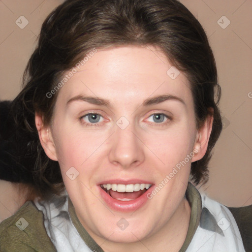 Joyful white young-adult female with medium  brown hair and green eyes