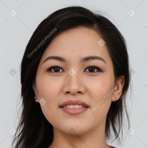 Joyful asian young-adult female with long  brown hair and brown eyes