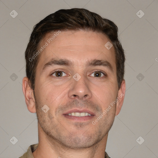 Joyful white adult male with short  brown hair and brown eyes