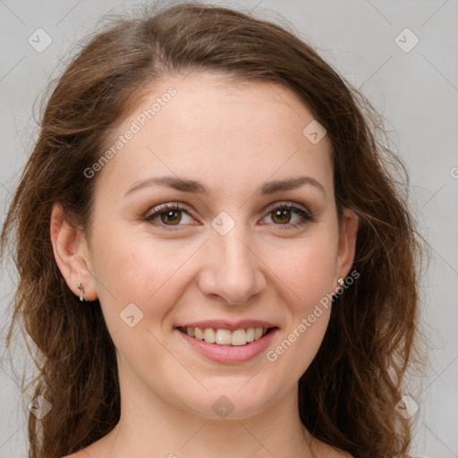 Joyful white young-adult female with long  brown hair and green eyes