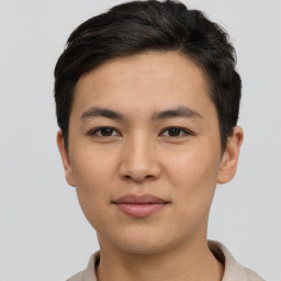 Joyful asian young-adult male with short  brown hair and brown eyes